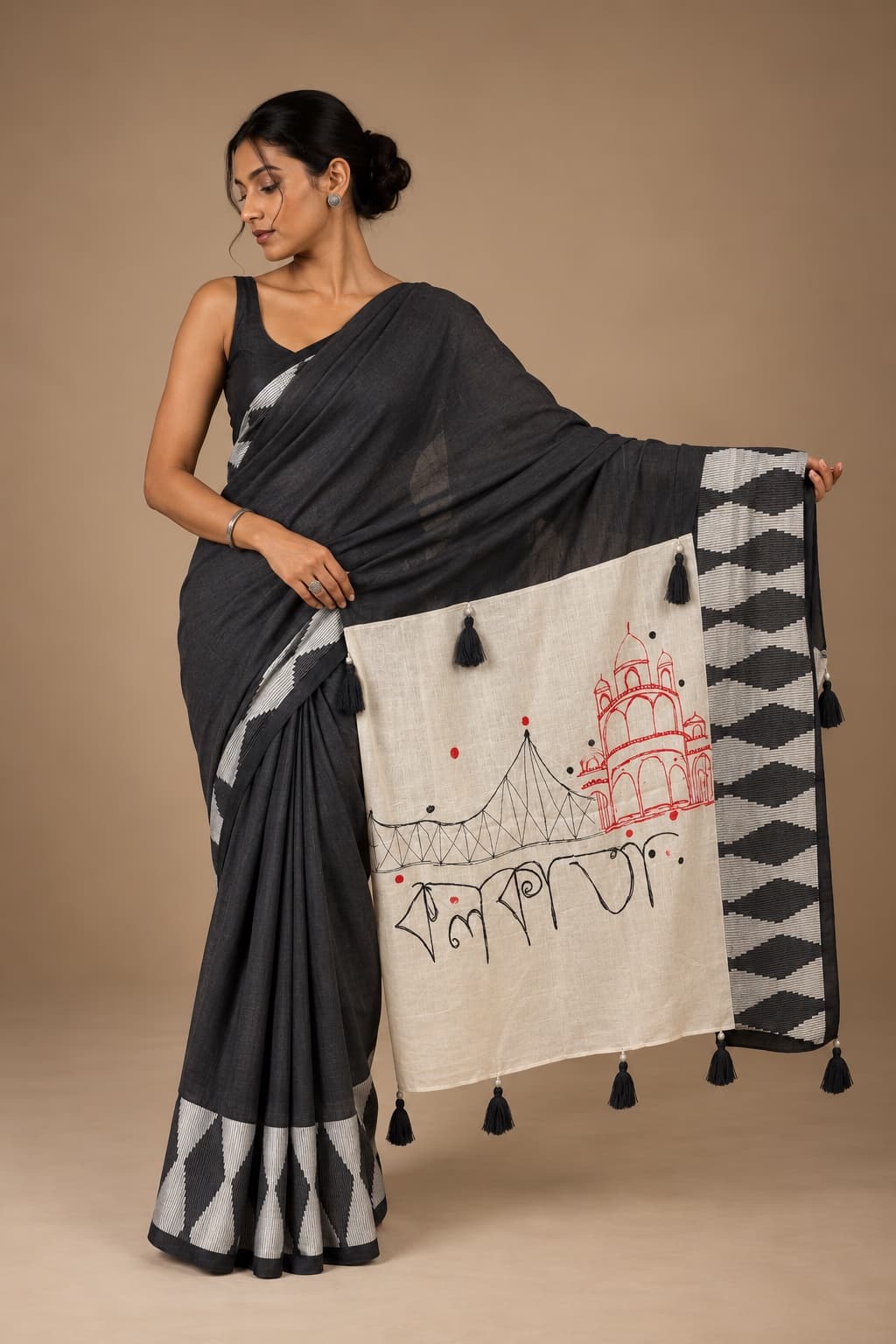 Model wearing EHSAAS 01 in black, ivory and red with an architectural illustrated panel
